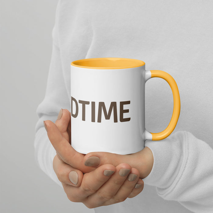 White ceramic mug with yellow handle & interior, featuring "DTIME" text, held by hands.