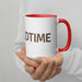 White ceramic coffee mug with red handle & interior, held by hands. Features "DTIME" text.