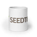 White ceramic coffee mug with brown 'SEEDTI' text and a vibrant green sprout design.