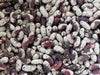 Speckled borlotti beans. White with reddish-brown spots, a popular legume for cooking and healthy meals.