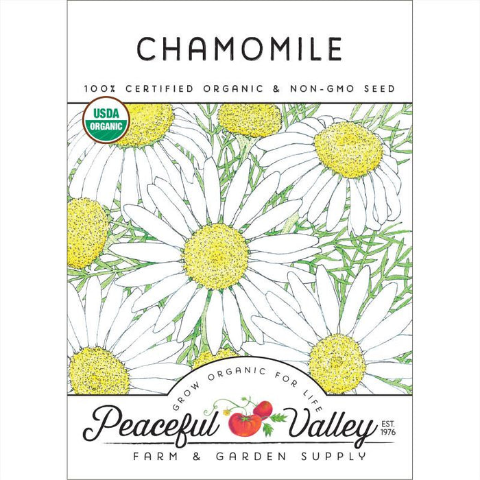 Organic chamomile seed packet: USDA Certified, non-GMO. Features white flowers, green leaves. Peaceful Valley Farm & Garden Supply.