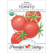 Heirloom Burbank Organic Tomato seed packet with four red tomatoes. USDA certified, non-GMO gardening seeds from Peaceful Valley.